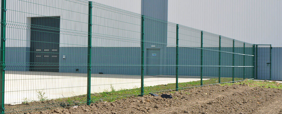A Run Of Security Mesh Fencing Around A Depot