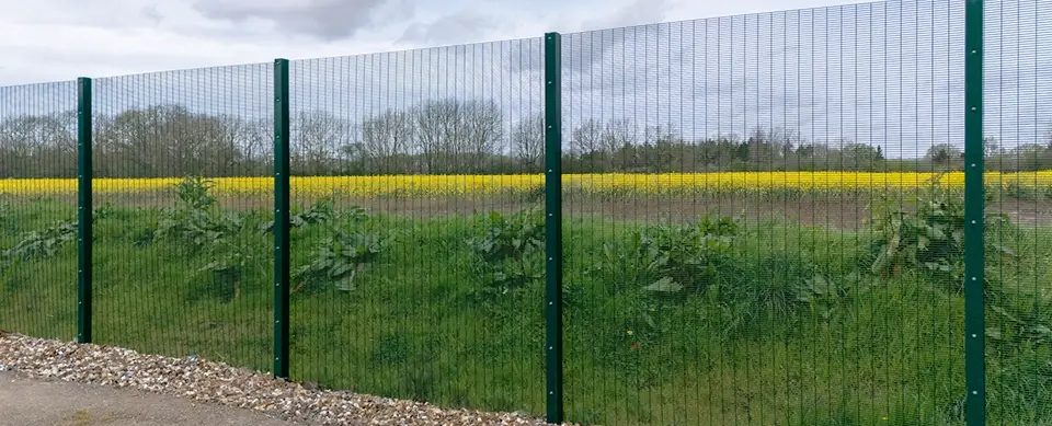 Single-Wire Mesh Fencing Around The Perimeter Of A Solar Farm