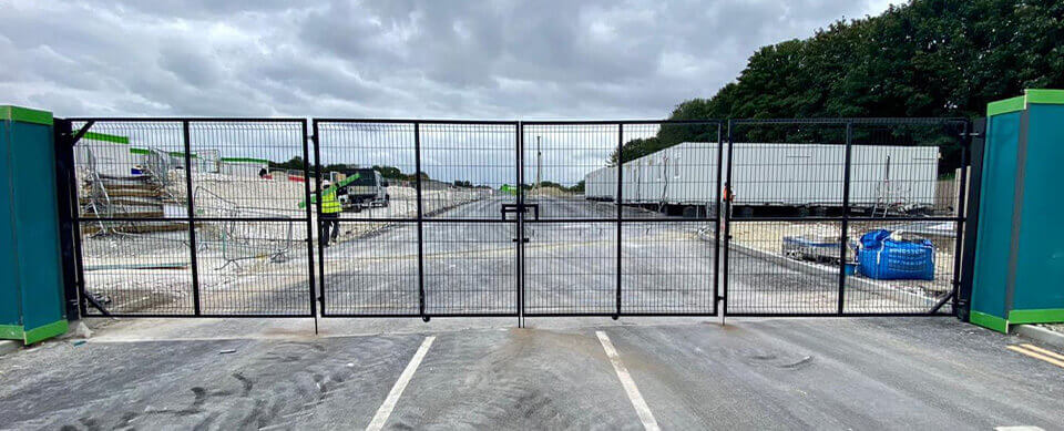 Double-Lead Bi-Folding SiteGard Gate Over A Wide Site Entrance