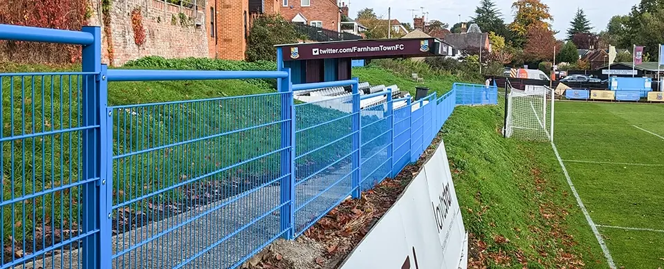 Extra High Sports Fencing Between Residential and Football Pitch